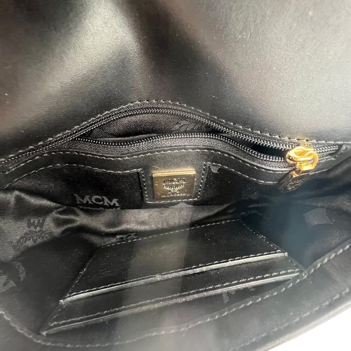 MCM Mini Handle Bag Evening Bag Designer Bags MCM coat outerwear pufferseason second hand vintage shop österreich germany deutschland angebot daunenjacke winterjacke jacke