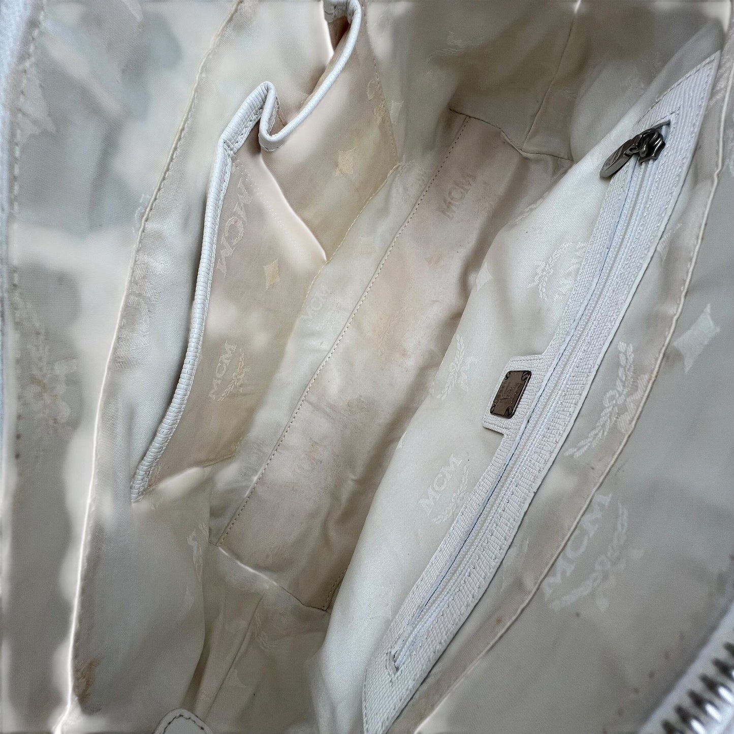 MCM Munich Bag Handbag Handtasche Designer Bags MCM coat outerwear pufferseason second hand vintage shop österreich germany deutschland angebot daunenjacke winterjacke jacke