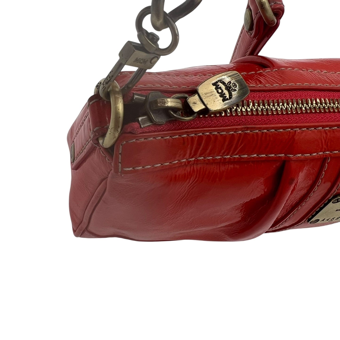 MCM Munich Mini Bag Handbag Handtasche Designer Bags MCM coat outerwear pufferseason second hand vintage shop österreich germany deutschland angebot daunenjacke winterjacke jacke