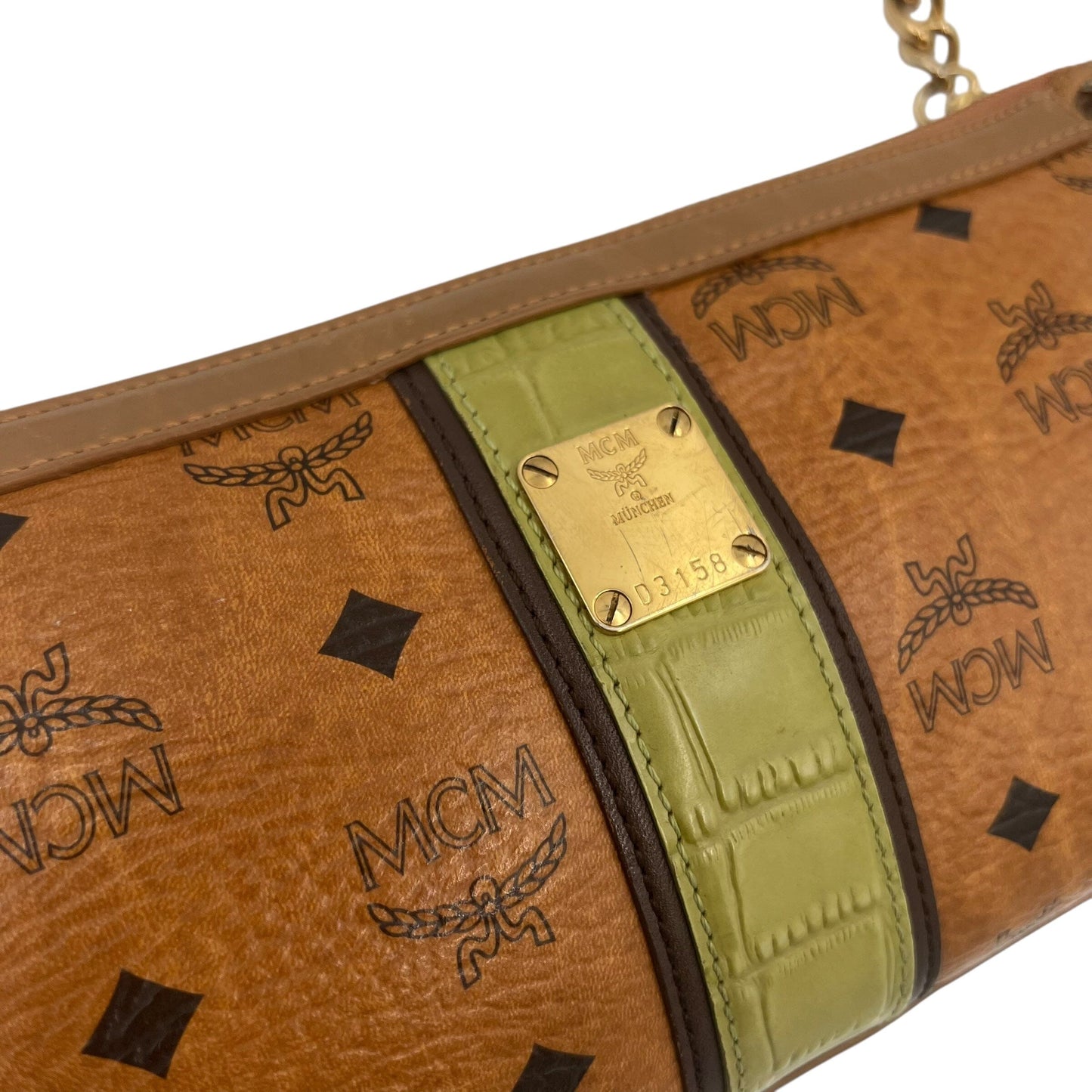 MCM Munich Mini Bag Handbag Handtasche Designer Bags MCM coat outerwear pufferseason second hand vintage shop österreich germany deutschland angebot daunenjacke winterjacke jacke