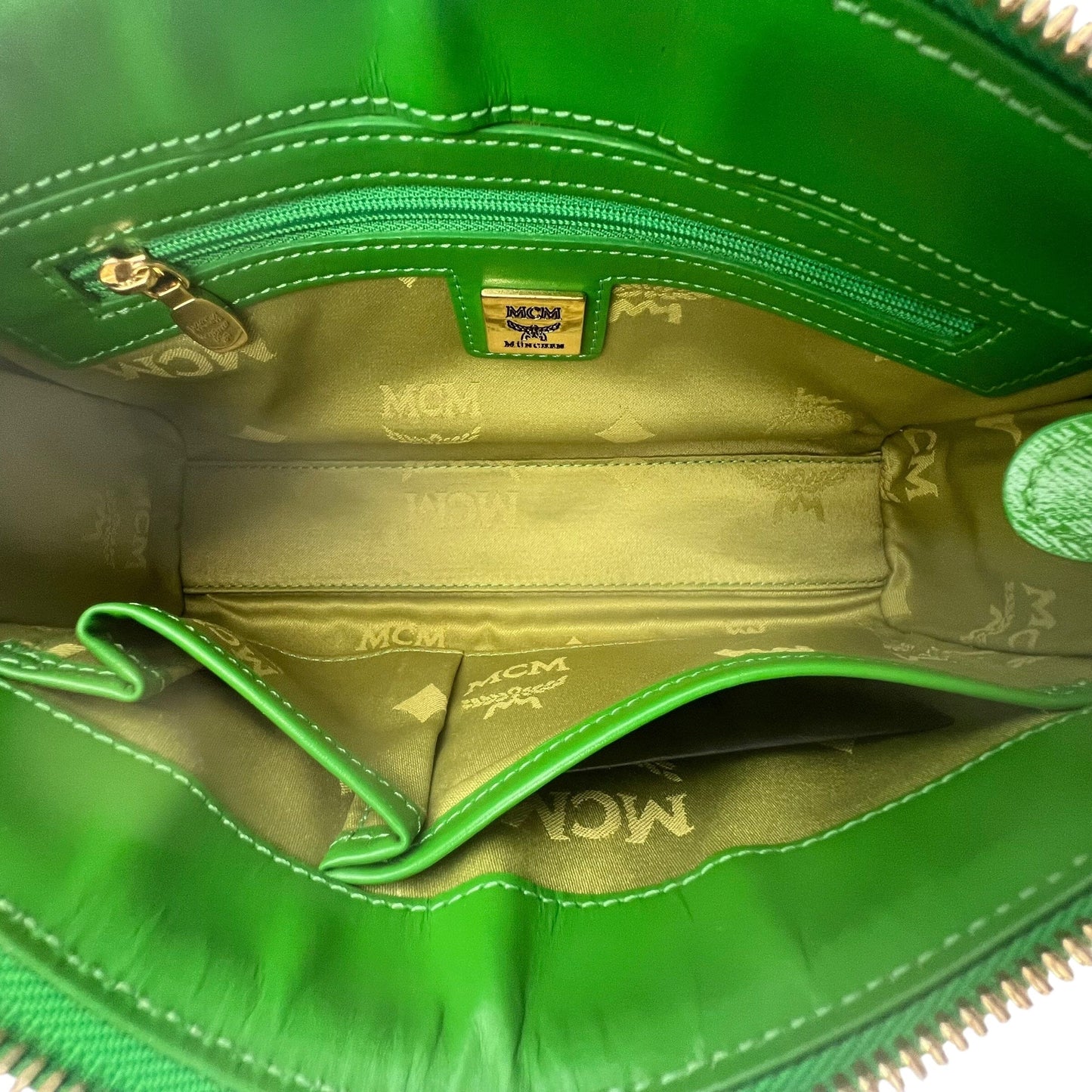 MCM Munich Mini Bag Handbag Handtasche Designer Bags MCM coat outerwear pufferseason second hand vintage shop österreich germany deutschland angebot daunenjacke winterjacke jacke