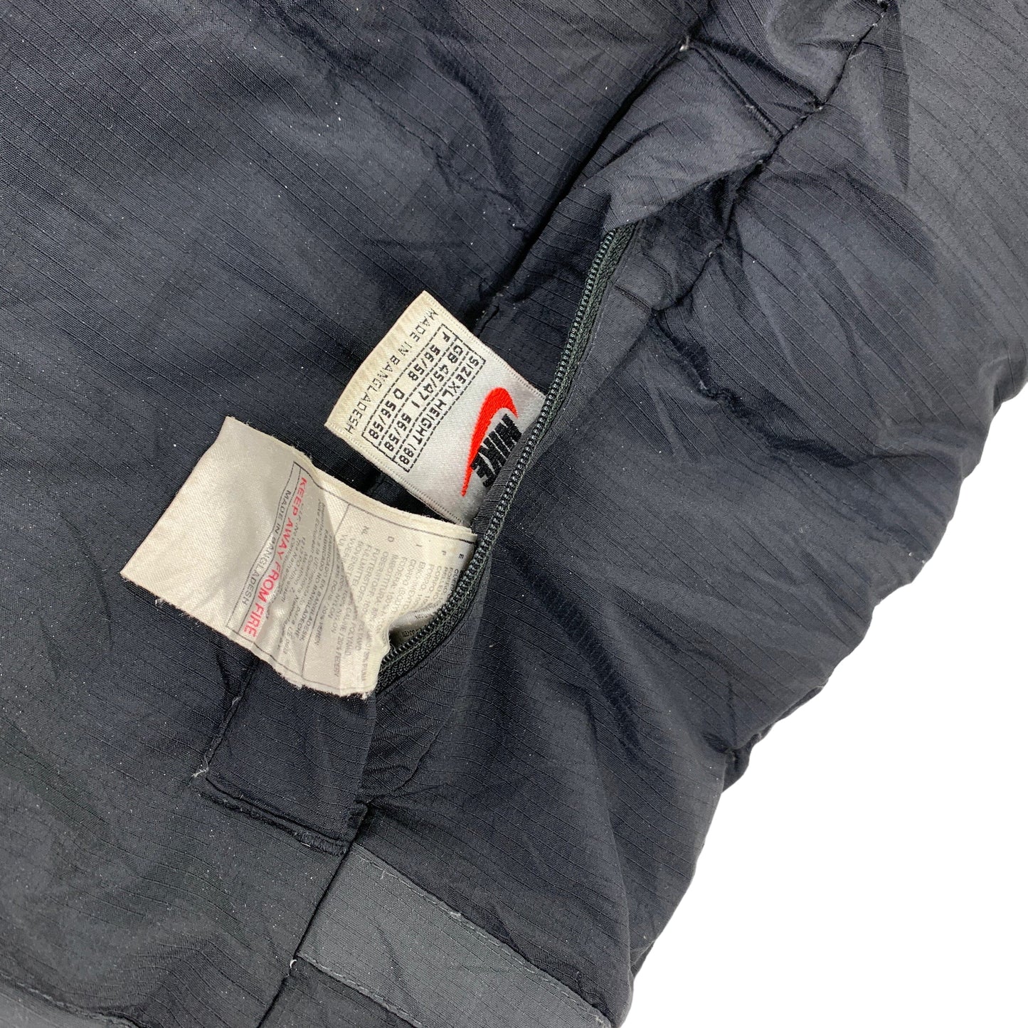 Nike Reverse Puffer Reversible - XL Nike Nike coat outerwear pufferseason second hand vintage shop österreich germany deutschland angebot daunenjacke winterjacke jacke