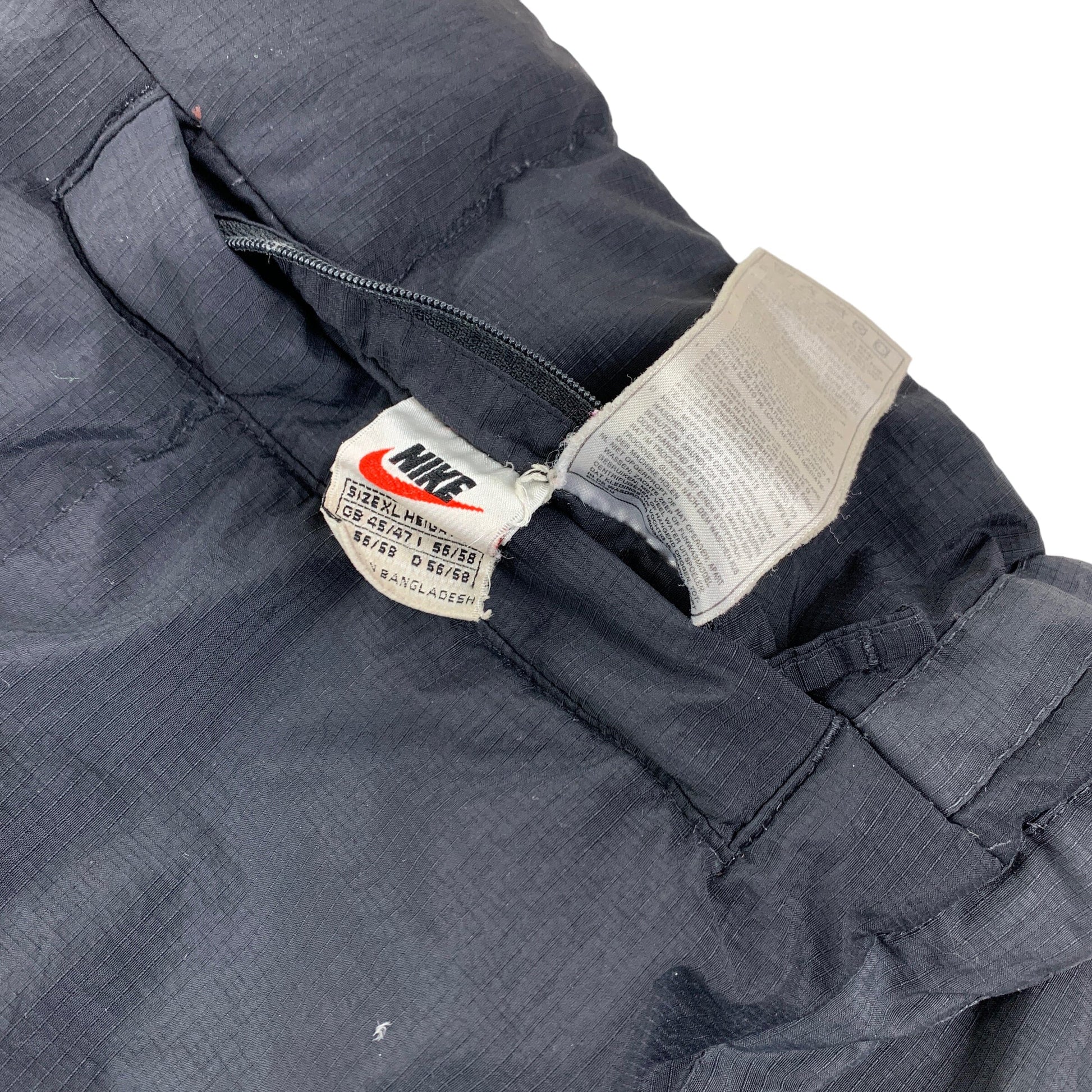 Vintage Nike Reverse Puffer Jacket - XL Nike Nike coat outerwear pufferseason second hand vintage shop österreich germany deutschland angebot daunenjacke winterjacke jacke