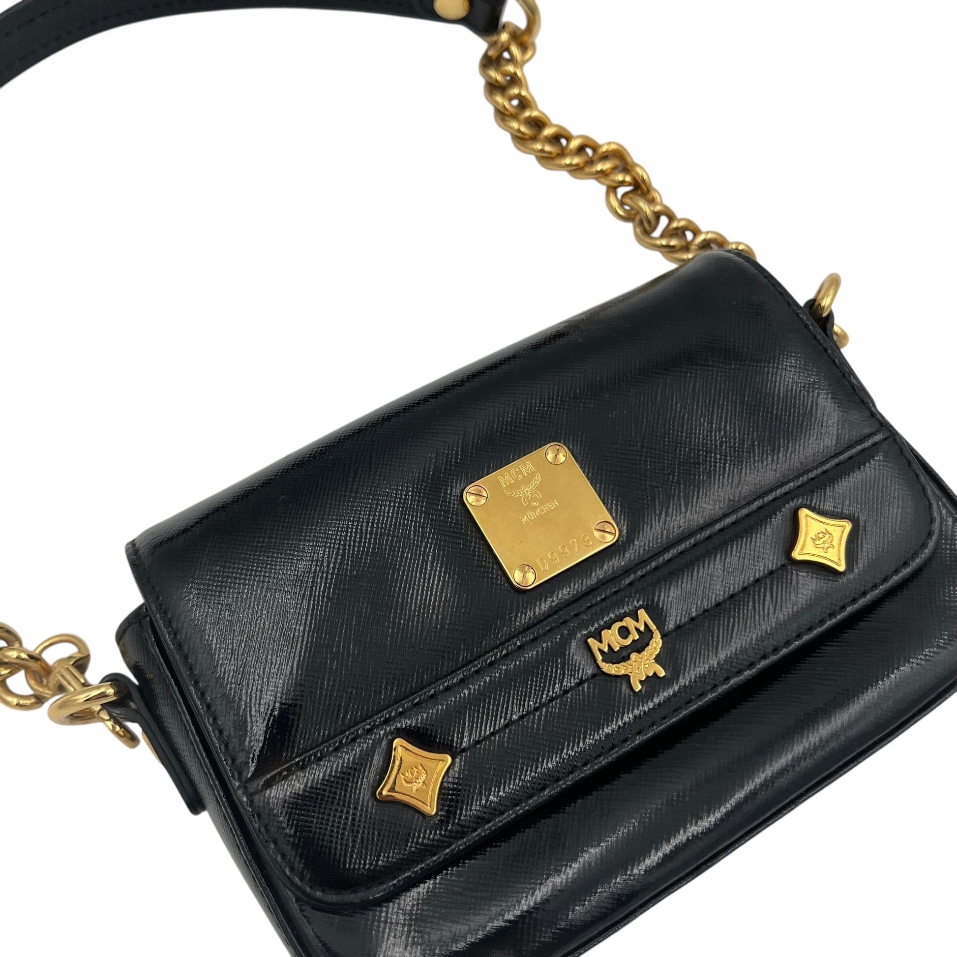 MCM Mini Handle Bag Evening Bag Designer Bags MCM coat outerwear pufferseason second hand vintage shop österreich germany deutschland angebot daunenjacke winterjacke jacke