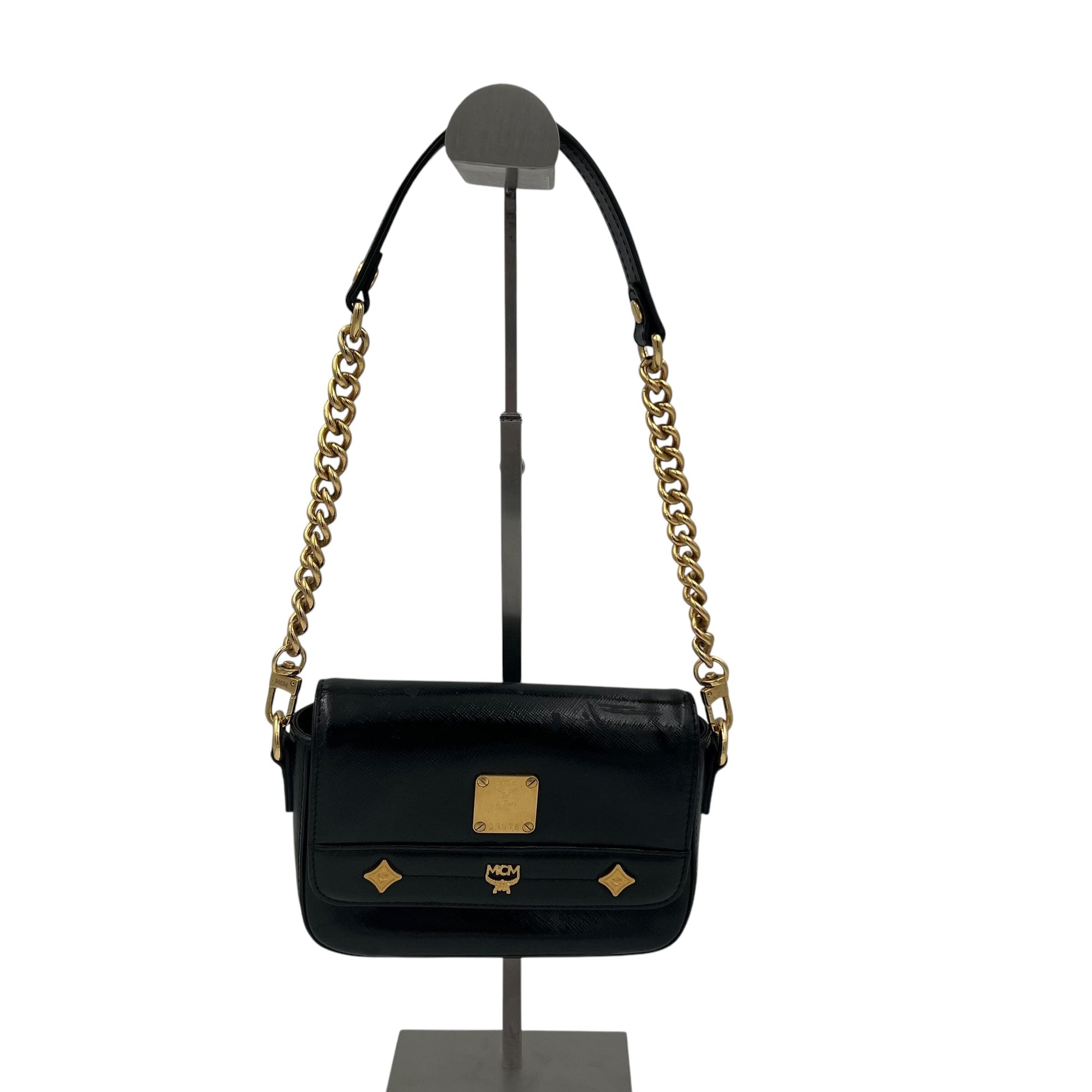 MCM Mini Handle Bag Evening Bag Designer Bags MCM coat outerwear pufferseason second hand vintage shop österreich germany deutschland angebot daunenjacke winterjacke jacke