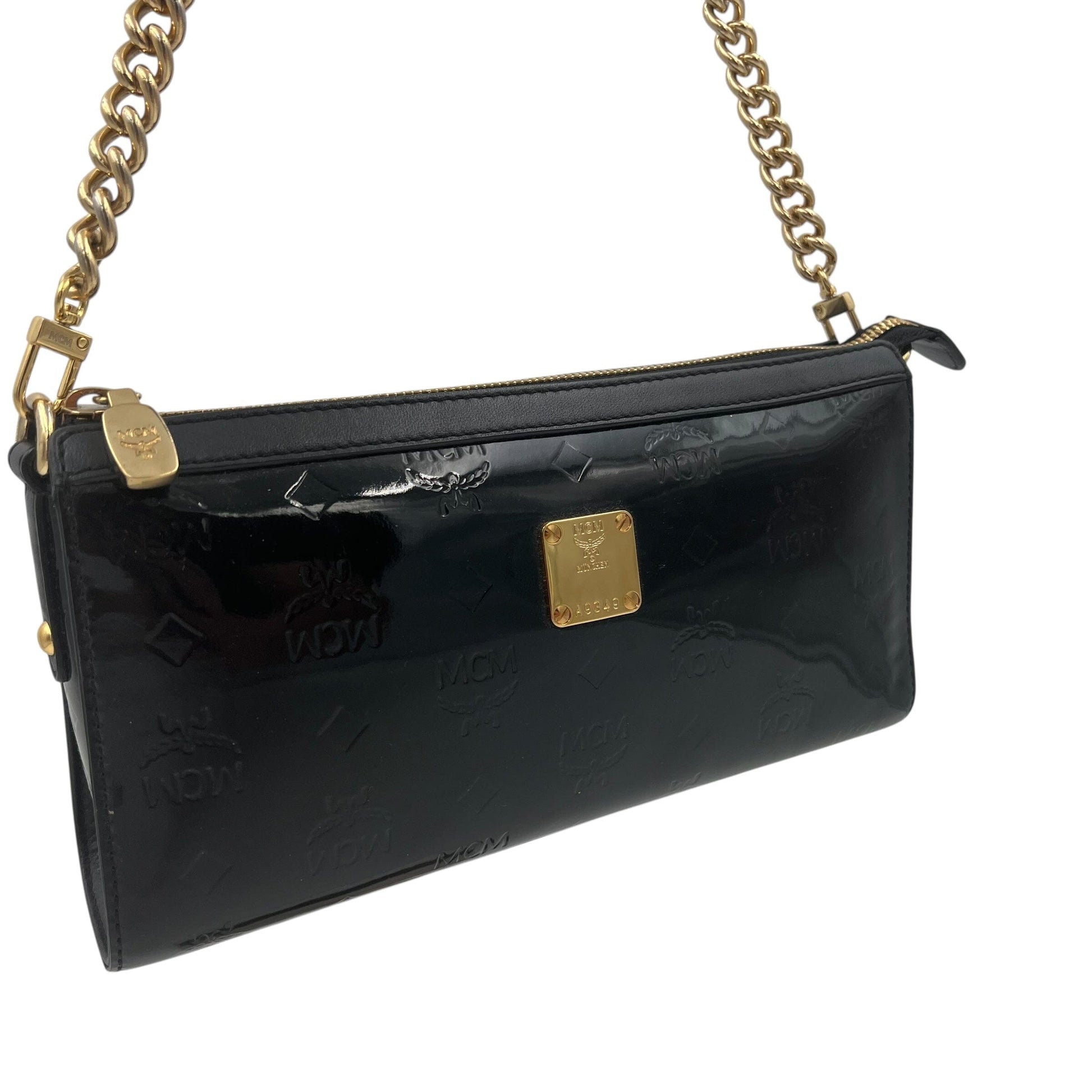 MCM Munich Mini Bag Handbag Handtasche Designer Bags MCM coat outerwear pufferseason second hand vintage shop österreich germany deutschland angebot daunenjacke winterjacke jacke