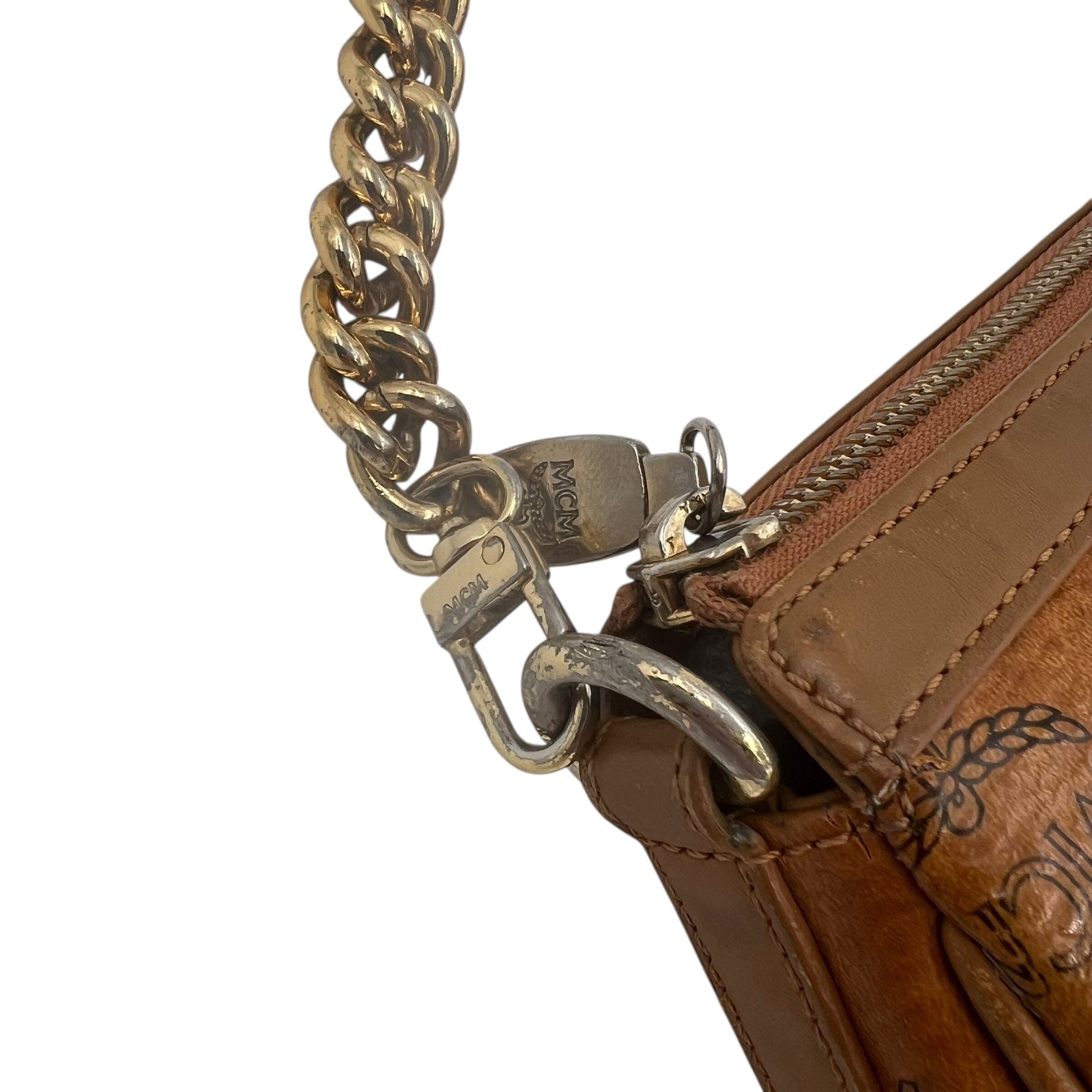 MCM Munich Mini Bag Handbag Handtasche Designer Bags MCM coat outerwear pufferseason second hand vintage shop österreich germany deutschland angebot daunenjacke winterjacke jacke