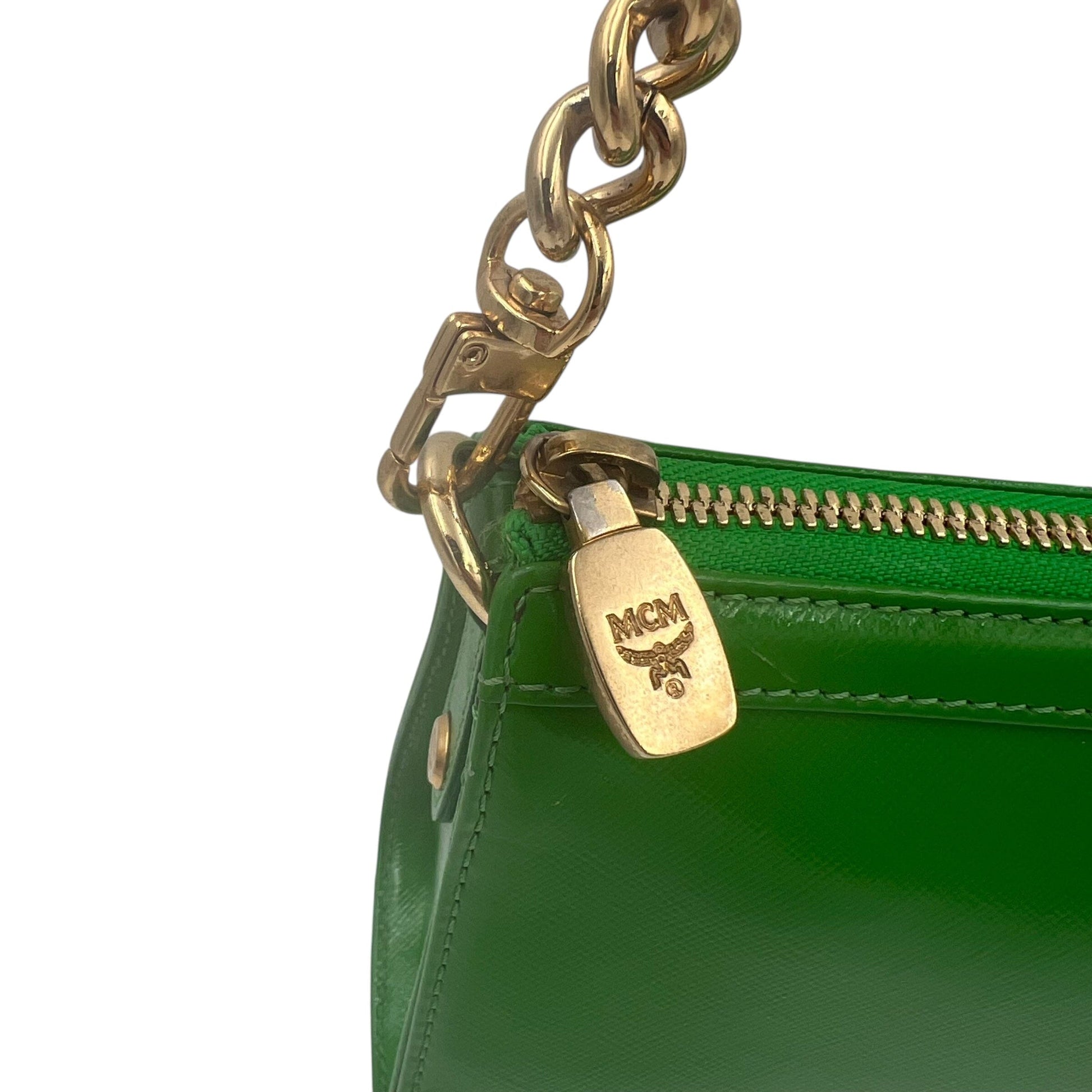 MCM Munich Mini Bag Handbag Handtasche Designer Bags MCM coat outerwear pufferseason second hand vintage shop österreich germany deutschland angebot daunenjacke winterjacke jacke