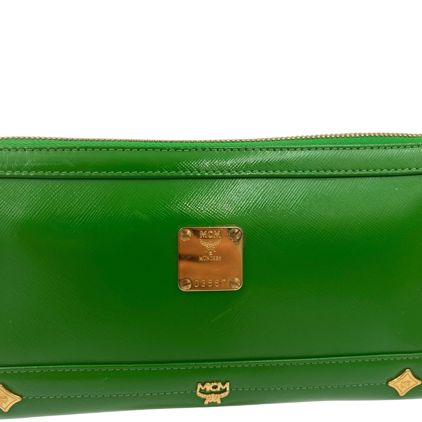 MCM Munich Mini Bag Handbag Handtasche Designer Bags MCM coat outerwear pufferseason second hand vintage shop österreich germany deutschland angebot daunenjacke winterjacke jacke