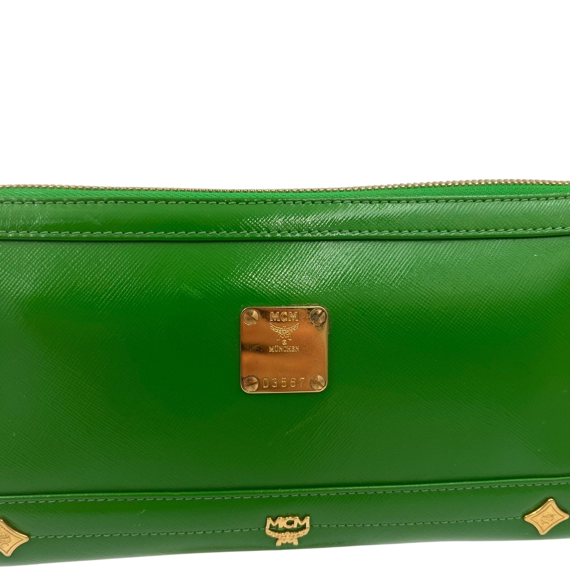 MCM Munich Mini Bag Handbag Handtasche Designer Bags MCM coat outerwear pufferseason second hand vintage shop österreich germany deutschland angebot daunenjacke winterjacke jacke