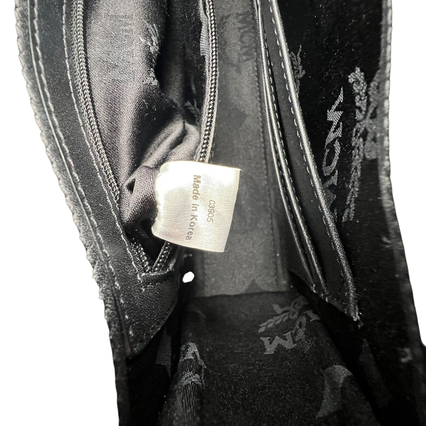 MCM Munich Mini Bag Handbag Handtasche Designer Bags MCM coat outerwear pufferseason second hand vintage shop österreich germany deutschland angebot daunenjacke winterjacke jacke