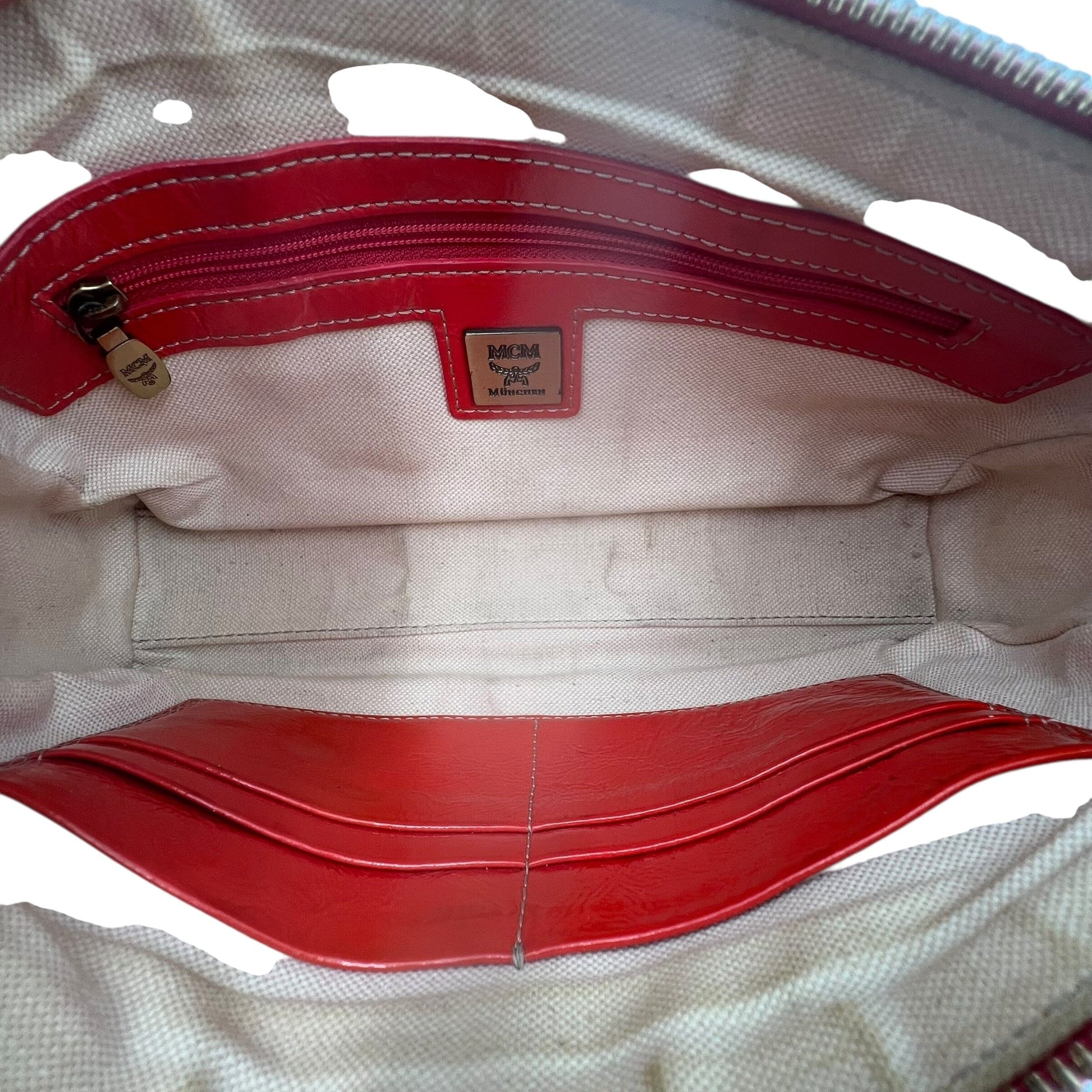 MCM Munich Mini Bag Handbag Handtasche Designer Bags MCM coat outerwear pufferseason second hand vintage shop österreich germany deutschland angebot daunenjacke winterjacke jacke